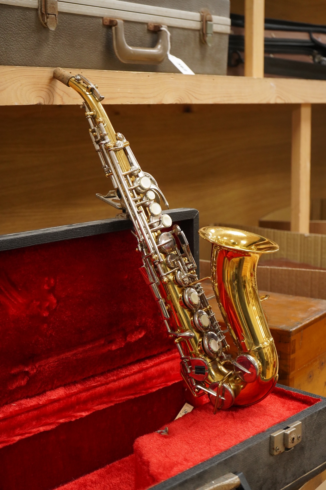 A cased Borgani soprano saxophone